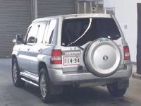 Mitsubishi PAJERO IO лот № 4738 оценка R  с аукциона в Японии 1