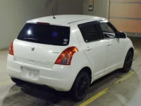 Suzuki SWIFT лот № 7043 оценка R  с аукциона в Японии 1
