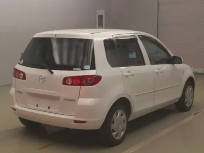 Mazda DEMIO  с аукциона в Японии