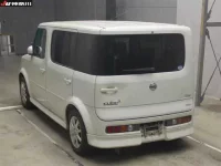 Nissan CUBECUBIC лот № 6059 оценка R  с аукциона в Японии 1