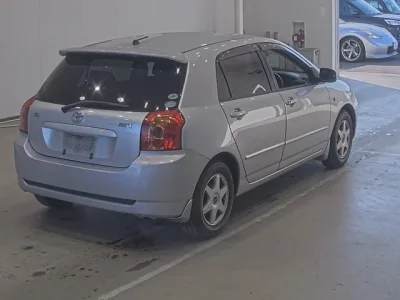 Toyota COROLLA RUNX  с аукциона в Японии