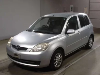 Mazda DEMIO  с аукциона в Японии