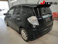 Honda FIT лот № 1009 оценка 3.5  с аукциона в Японии 1