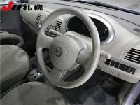 Nissan MARCH лот № 73 оценка 2  с аукциона в Японии 2