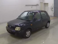 Nissan MARCH лот № 8517 оценка 3  с аукциона в Японии 2