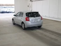 Toyota COROLLA RUNX лот № 2614 оценка RA  с аукциона в Японии 1