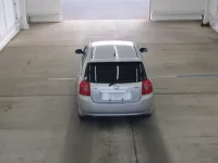 Toyota COROLLA RUNX лот № 2614 оценка RA  с аукциона в Японии 2