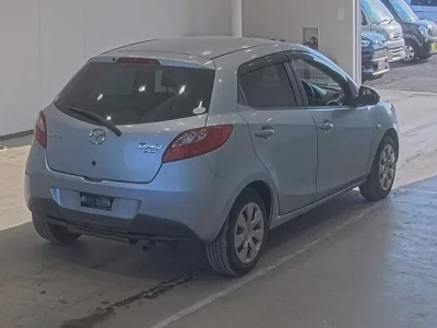Mazda DEMIO  с аукциона в Японии