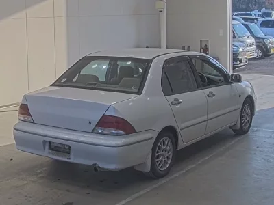 Mitsubishi LANCER  с аукциона в Японии