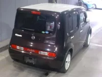 Nissan CUBE лот № 1064 оценка   с аукциона в Японии 1