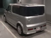 Nissan CUBECUBIC лот № 8306 оценка 3.5  с аукциона в Японии 1