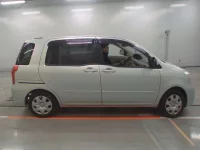 Toyota RAUM лот № 10077 оценка 3.5  с аукциона в Японии 2