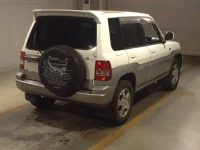 Mitsubishi PAJERO IO лот № 200 оценка RA  с аукциона в Японии 1