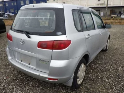Mazda DEMIO  с аукциона в Японии