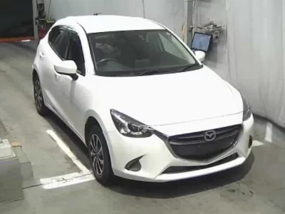 Mazda DEMIO  с аукциона в Японии