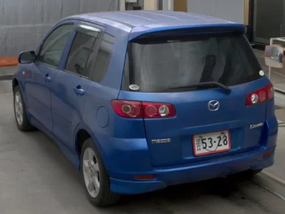 Mazda DEMIO  с аукциона в Японии