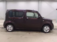 Nissan CUBE лот № 5557 оценка 3.5  с аукциона в Японии 2