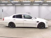 Nissan CIMA лот № 5563 оценка 3  с аукциона в Японии 2