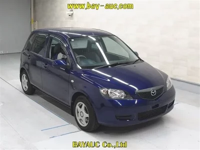 Mazda DEMIO  с аукциона в Японии
