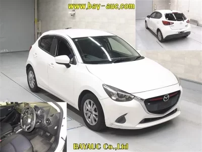 Mazda DEMIO  с аукциона в Японии