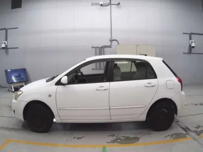 Toyota COROLLA RUNX  с аукциона в Японии