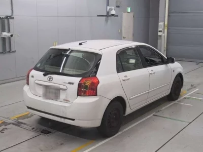 Toyota COROLLA RUNX  с аукциона в Японии