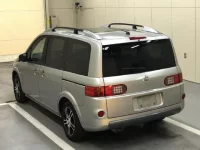 Nissan LAFESTA лот № 1033 оценка 4  с аукциона в Японии 1