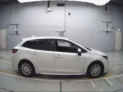 Toyota COROLLA TOURING  с аукциона в Японии