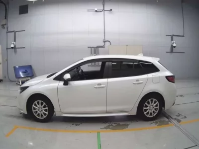 Toyota COROLLA TOURING  с аукциона в Японии