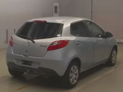 Mazda DEMIO  с аукциона в Японии
