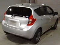 Nissan NOTE лот № 7136 оценка 3.5  с аукциона в Японии 1