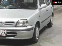 Nissan MARCH лот № 242 оценка 3.5  с аукциона в Японии 2