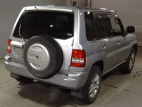 Mitsubishi PAJERO IO лот № 7143 оценка 2  с аукциона в Японии 1