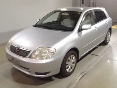 Toyota COROLLA RUNX  с аукциона в Японии