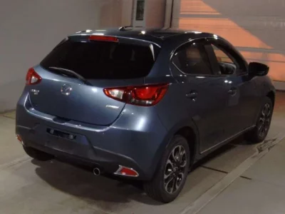 Mazda DEMIO  с аукциона в Японии