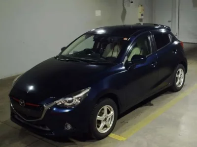 Mazda DEMIO  с аукциона в Японии