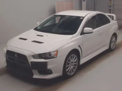 Mitsubishi LANCER  с аукциона в Японии