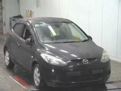 Mazda DEMIO  с аукциона в Японии