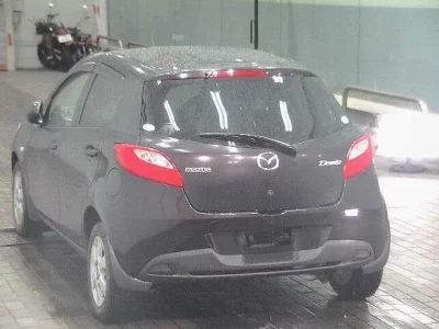 Mazda DEMIO  с аукциона в Японии