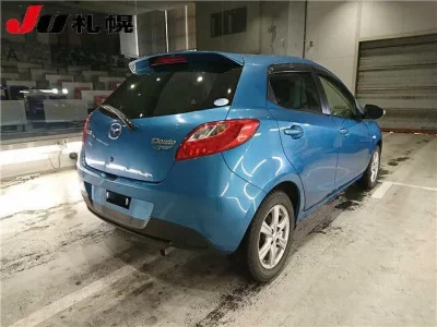 Mazda DEMIO  с аукциона в Японии