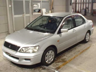 Mitsubishi LANCER  с аукциона в Японии