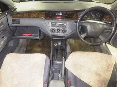 Mitsubishi LANCER  с аукциона в Японии
