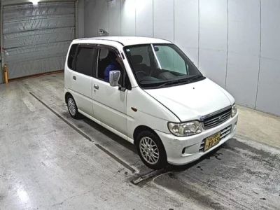 Daihatsu MOVE  с аукциона в Японии