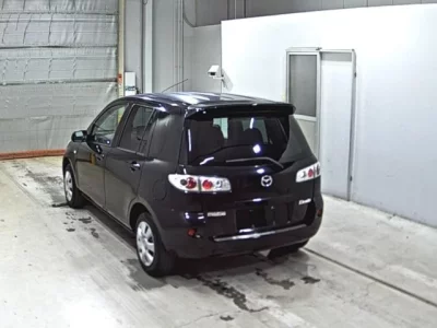 Mazda DEMIO  с аукциона в Японии