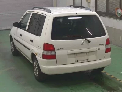Mazda DEMIO  с аукциона в Японии