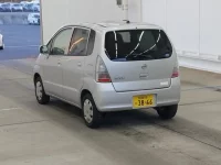 Nissan MOCO лот № 2456 оценка RA  с аукциона в Японии 1