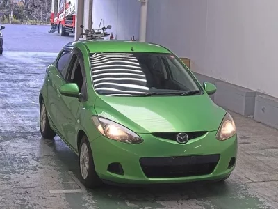 Mazda DEMIO  с аукциона в Японии