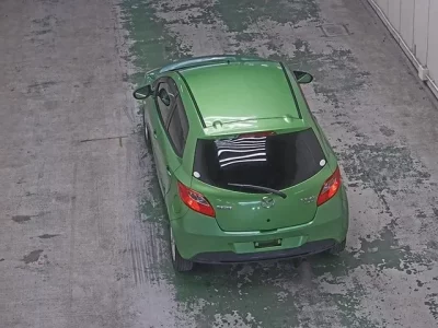 Mazda DEMIO  с аукциона в Японии