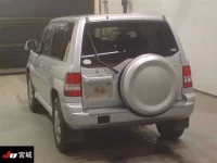 Mitsubishi PAJERO IO лот № 7213 оценка 3  с аукциона в Японии 1