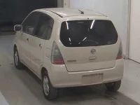 Nissan MOCO лот № 9511 оценка 3  с аукциона в Японии 1